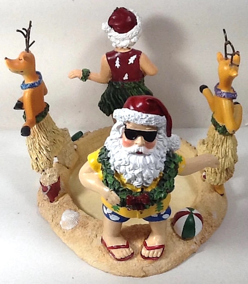 Santa, Mrs Claus and Reindeer Hula Dancing Candle
