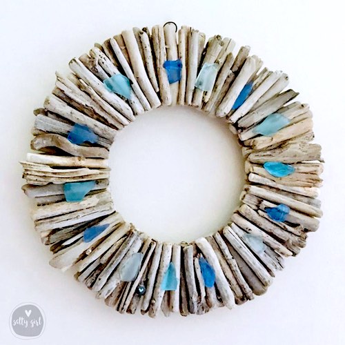 artist: Cherie Herne - driftwood wreath with beach glass