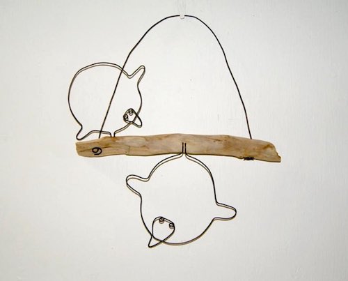 artist: Jon Piper - wire art on driftwood mount