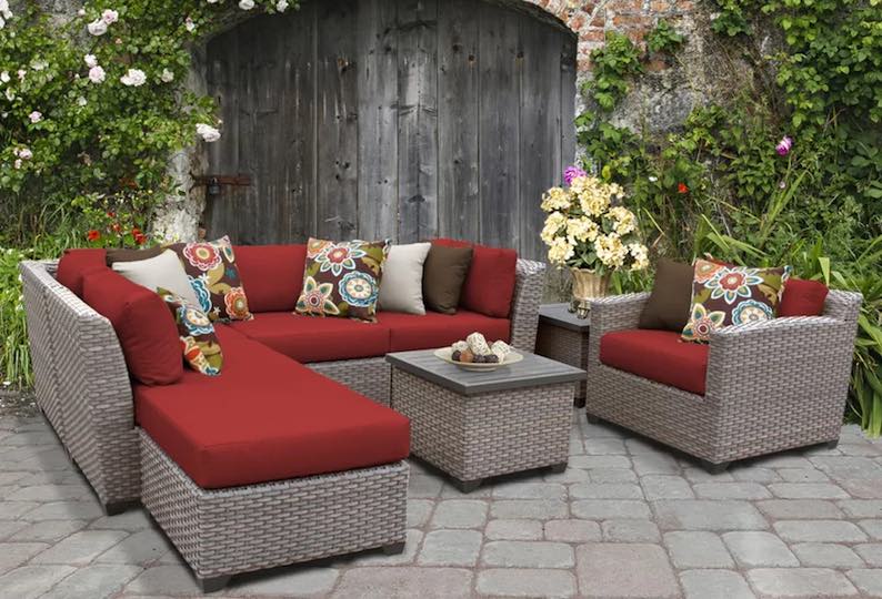 Merlyn 8 Piece Rattan Sectional Seating Group with Cushions